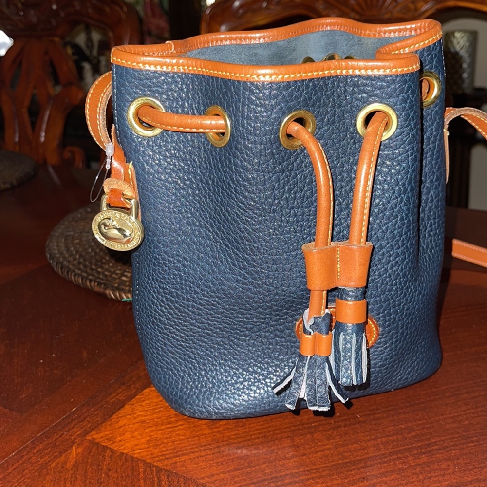 Dooney & Bourke Navy and Tan Pebbled Leather Drawstring Crossbody - Picture 2 of 9